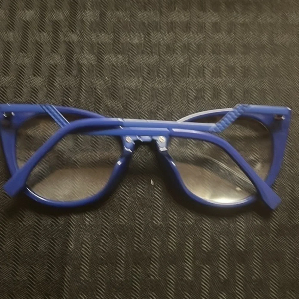 Royal blue plastic frame with metal arms. From Vooogue Me.